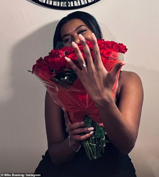 He shared a slew of photos but did not reveal the identity of his now fiancée as she hid her face behind a beautifully purchased red rose while showing off the sparkler on her left hand