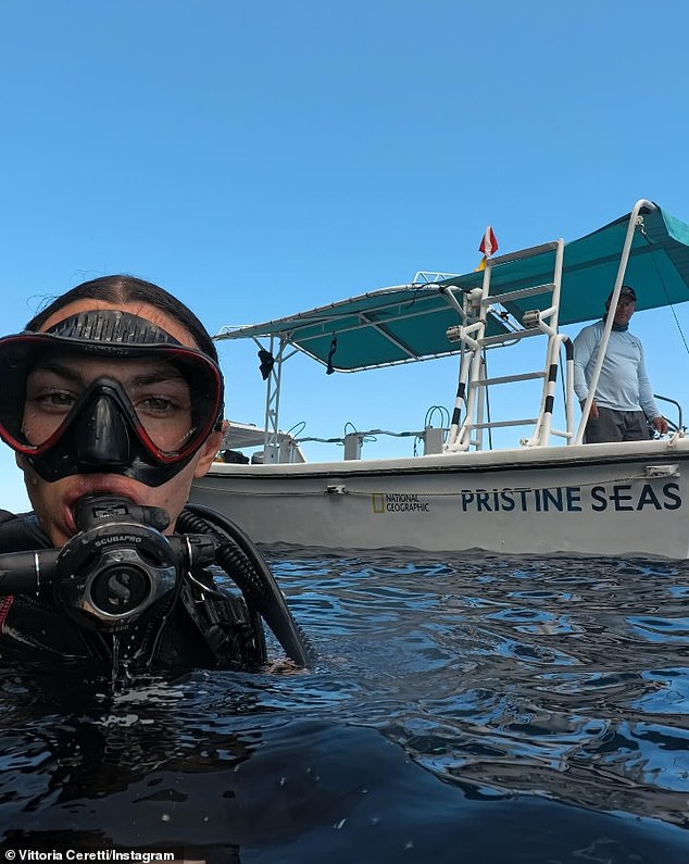 She also shared photos of herself getting ready to go scuba diving