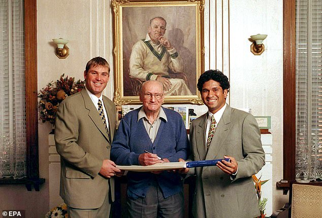 Bradman, pictured with Shane Warne and Sachin Tendulkar, canceled an Australian tour of South Africa while chairman of the Australian Cricket Board in 1970