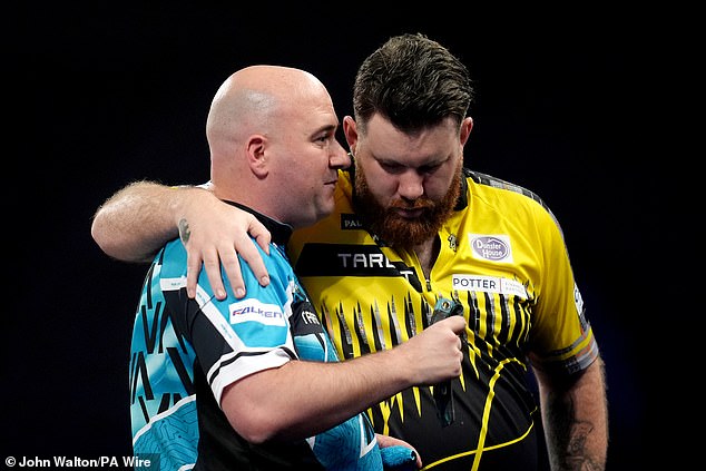 1735000352 901 Rob Cross appears to make an obscene gesture midway through