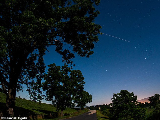 As the third-brightest object in the sky, the bright, consistent light from the ISS (pictured) is easy to spot against the dark background of the sky