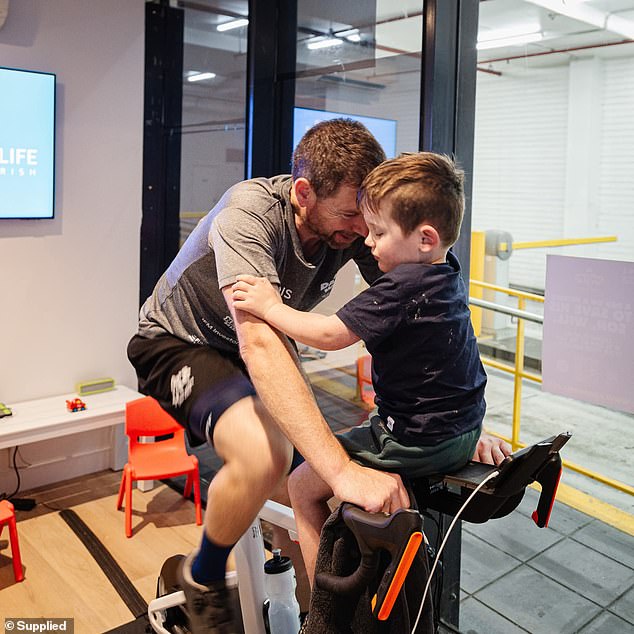 Will (pictured on the exercise bike) said cycling is mentally and physically tiring