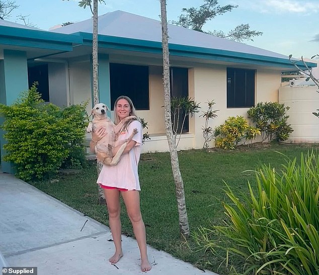 Samantha Royce bought a house in the village of Mele, just outside Port Vila, and rescued an island dog (pictured)