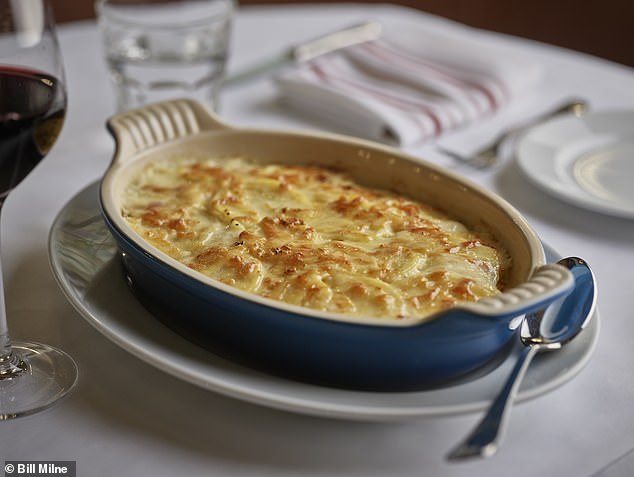 Chef Boulud recommends Gratin Dauphinois with the addition of black truffle