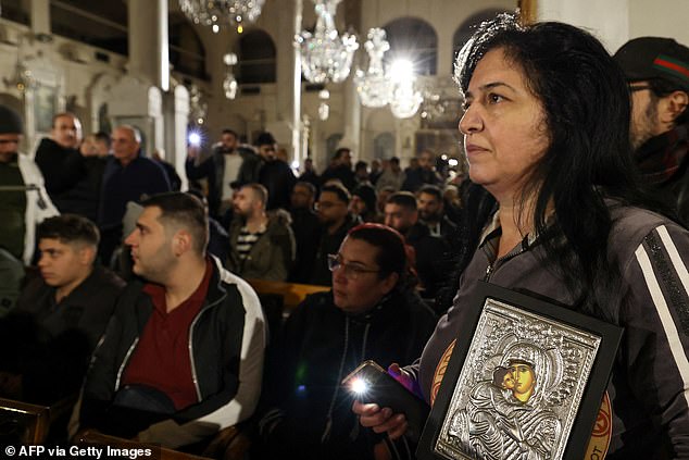 Christian worshipers hold a sit-in at the Mariamite Church in Damascus early December 24, 2024