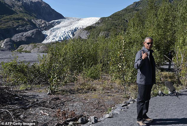 Former President Obama during a hike in Alaska on September 1, 2015. He made the trip to raise awareness of the threat of climate change after announcing that North America's highest point would be renamed Mount Denali