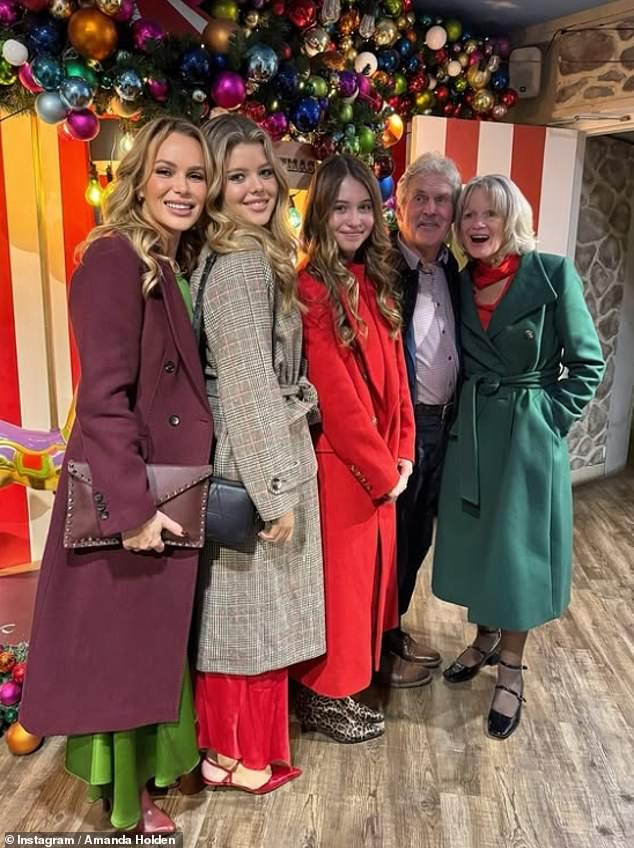 And leading the way was Amanda Holden, who brought the festive glamor as she commemorated the day with her daughters Lexi and Holly, mother Judith and stepfather Leslie.