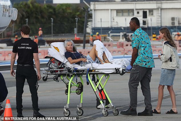 An Australian woman and her daughter are put into an air ambulance last week after being hospitalized in Fiji