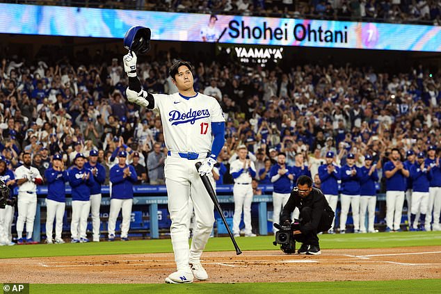 Ohtani, 17, is being honored for becoming the first MLB player to reach 50 home runs and 50 stolen bases in a single season during the first inning of a baseball game against the Colorado Rockies