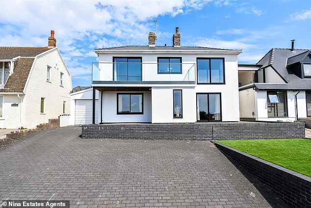 Impressive: this four-bedroom detached house in Barry is on the market for £875,000