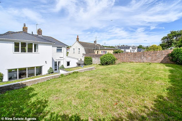 Lawn: The large property in Barry comes, as you would expect, with a sizable garden