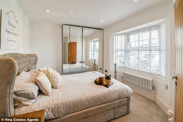 Cosy: One of the very comfortable bedrooms in the Barry house for sale for £410,000