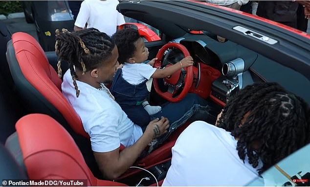 The Pink Dreads rapper then placed the toddler on his lap and his little hands on the steering wheel as Halle took photos of the moment on her phone.