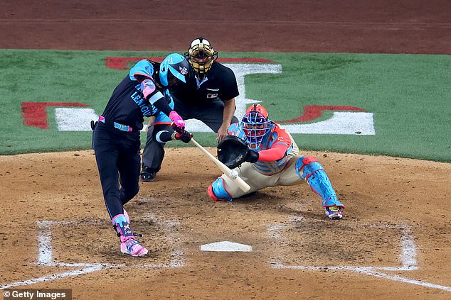 Elly De La Cruz hits a single during the All-Star Game at Globe Life Field in July