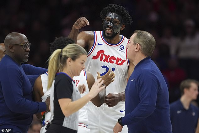 An angry Joel Embiid charged at the officials after the ejection and was restrained