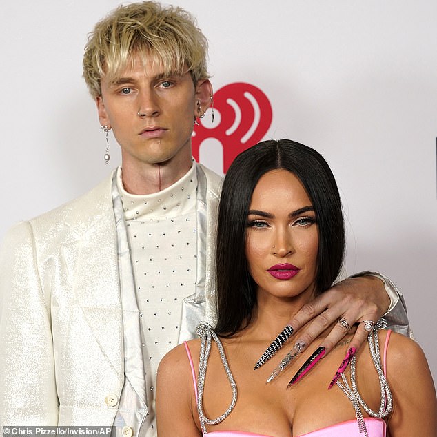 Megan (left) ended her relationship with Machine Gun (right) – the father of her unborn child – over Thanksgiving, amid claims he cheated (at the 2021 IHeartRadio Awards)