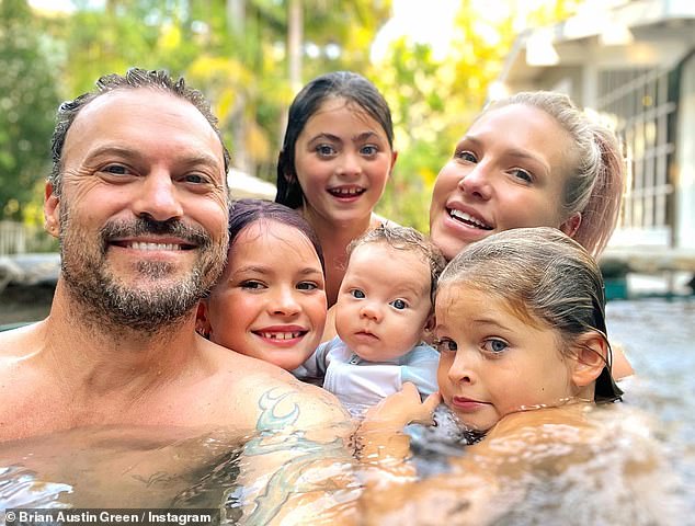 Brian Austin Green, 50, is dad to Noah, 11, Bodhi, nine, and Journey, seven, with Megan. He has two-year-old son Zane with Sharna Burgess, 39 (all pictured together here)