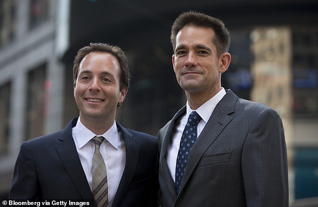 Michael A. Smith (right, pictured with Zillow CEO Spencer Rascoff) is being sued by the fast-food giant over the construction of a luxury apartment on top of a Manhattan building