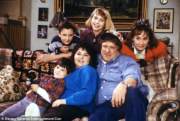 Gilbert (above left) is pictured on Roseanne in 1989 with co-stars Lecy Goranson, Laurie Metcalf, Michael Fishman, Roseanne Barr and John Goodman