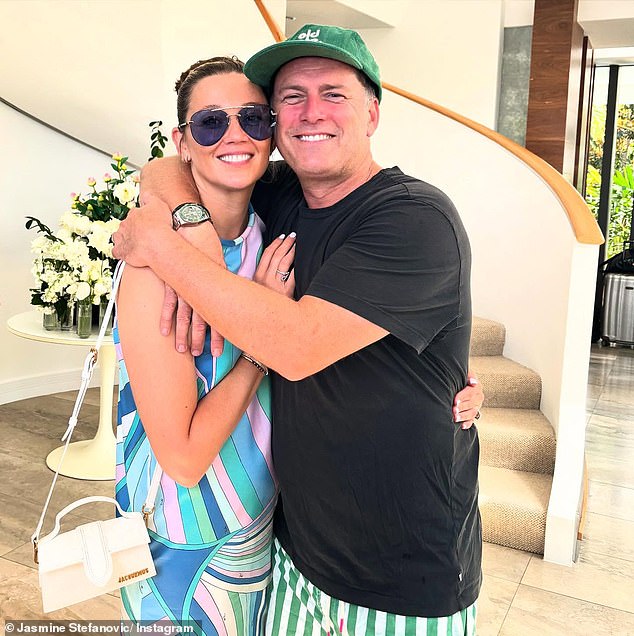 Karl Stefanovic (right) and Jasmine, together with their children, divide their time between Sydney and Queensland