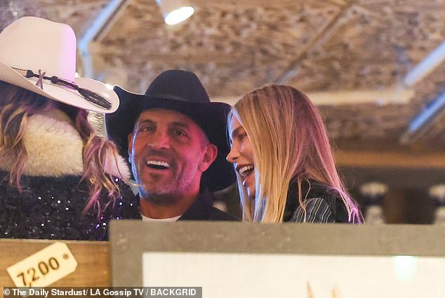 Meanwhile, Umansky was photographed last Wednesday kissing One Management Model Klaudia K (R) at Matsuhisa in Aspen, with whom he is 