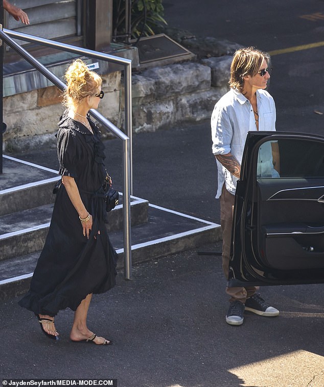 Nicole and Keith seemed in good spirits as they left the church together after the service