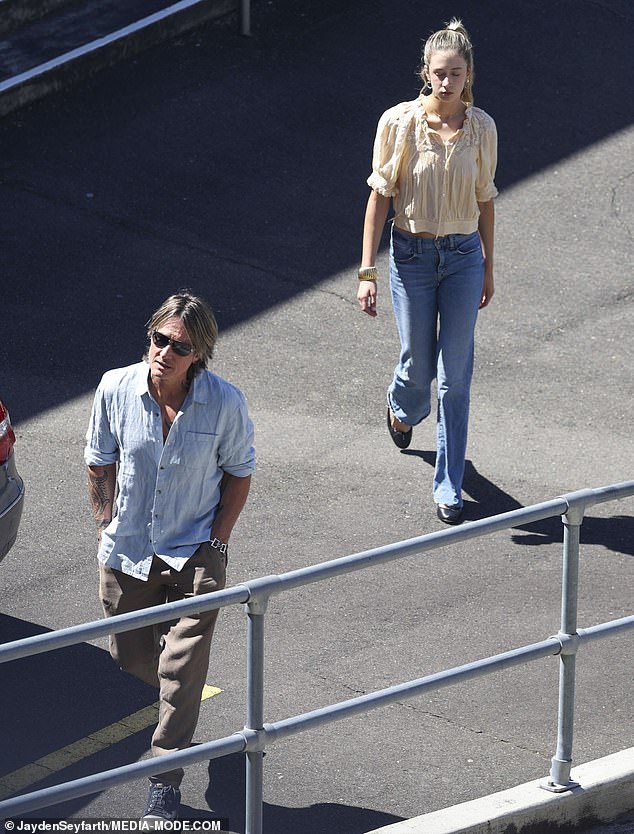 The family (Keith and Sunday are pictured) all spent Christmas morning at the same church where Nicole's mother Janelle's funeral was held in September.