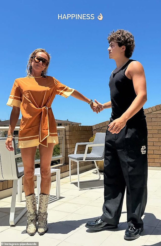 She posted a series of fun snaps of her and Justice striking a series of playful poses on a sun-drenched rooftop