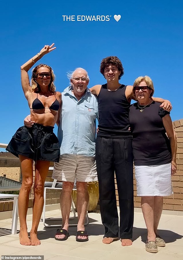 The entrepreneur then posted a photo of her and Justice with her parents on the same roof, giving insight into her family's Christmas celebrations