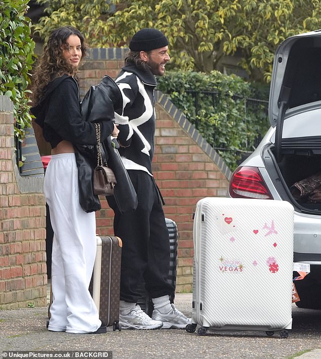 The former Love Islander, 34, and podcaster, 36, couldn't wipe the smiles off their faces as they headed out to spend their first Christmas season together