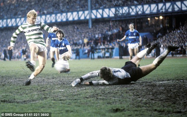 Celtic's Mo Johnston hits a shot during a 4-4 draw between Old Firm and Rangers in 1986