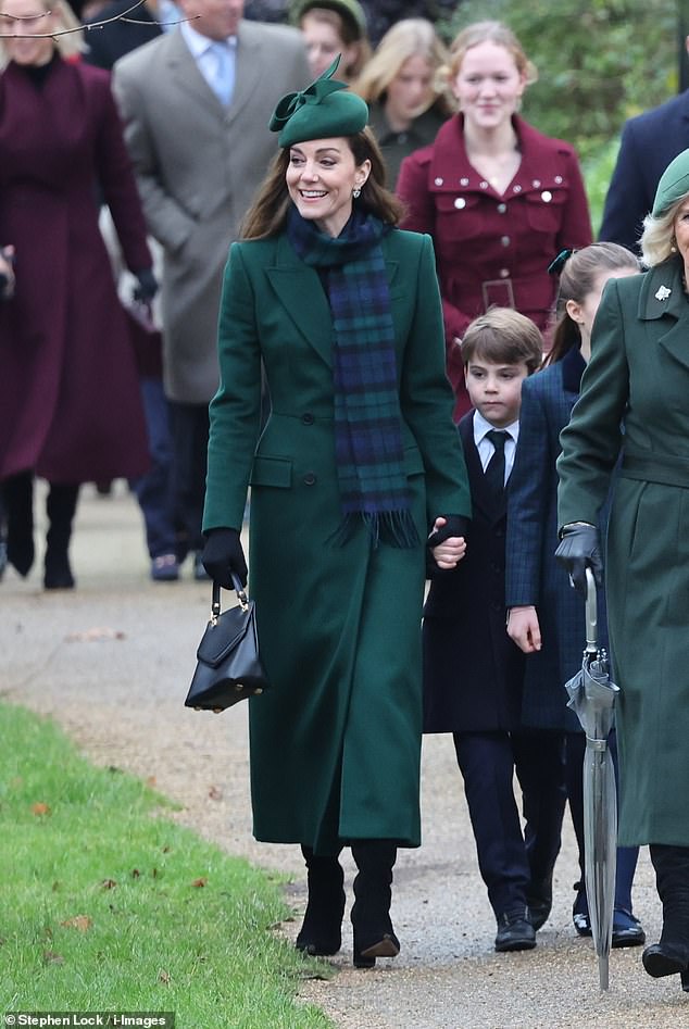 Prince Louis could be seen holding his mother's hand as the Waleses walked to St Mary Magdalene Church in Sandringham on Christmas morning