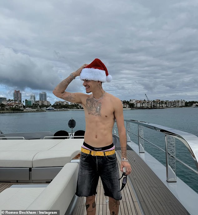 He later added another photo of himself posing shirtless in a Santa hat on board the family's £5 million luxury superyacht Seven for a pre-Christmas cruise