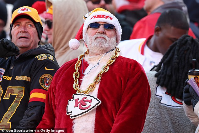 A Kansas City Chiefs fan dresses up as Santa Claus at an NFL game on Saturday