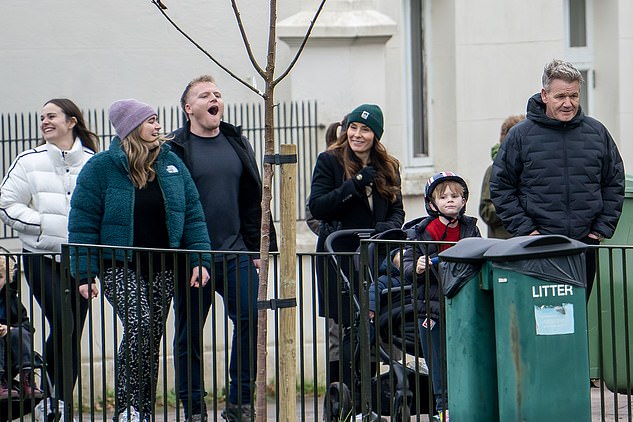 The family put on an animated display and couldn't wipe the smiles off their faces during their festive walk