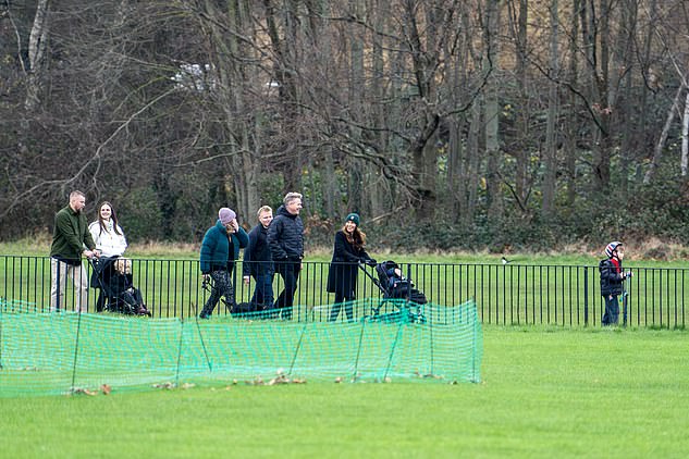 Oscar James rode in front on his scooter while the rest of the family followed behind