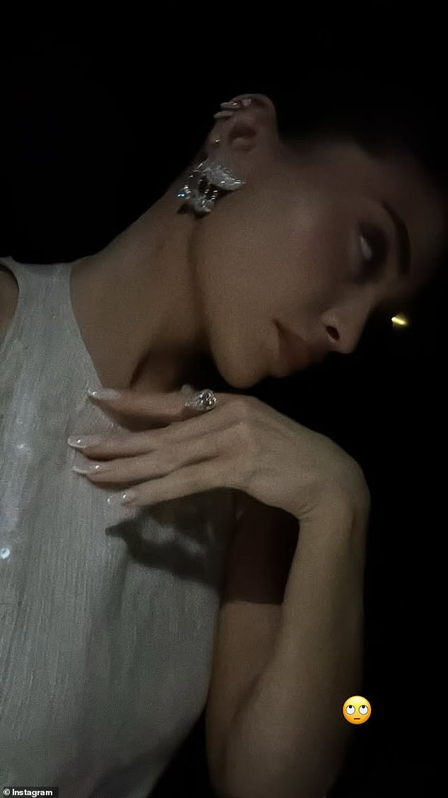 In a short clip, Kylie appeared to be in the car as she showed off her dazzling diamond jewelry and chic French manicure