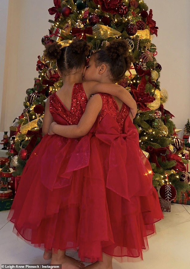 The former Little Mix alum took to her Instagram page with some heartbreaking snaps of the two toddlers hugging each other in gorgeous red dresses