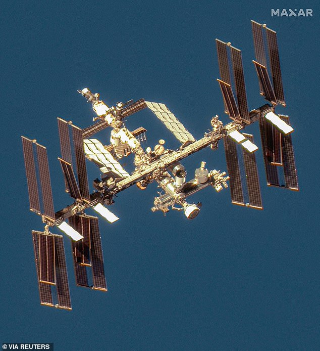 A satellite image shows an overview of the International Space Station with the Boeing Starliner spacecraft on June 7