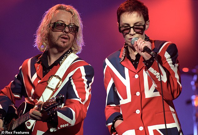 Performing with Dave Stewart at the Brit Awards in London in 1999