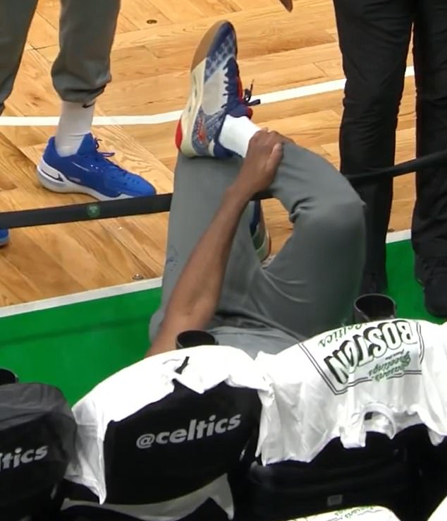 Embiid was seen holding his ankle after the freak fall but was able to start the game for Philly