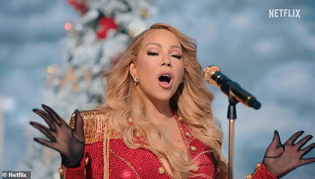 1735172321 953 Mariah Carey stuns as she performs her Christmas classic All