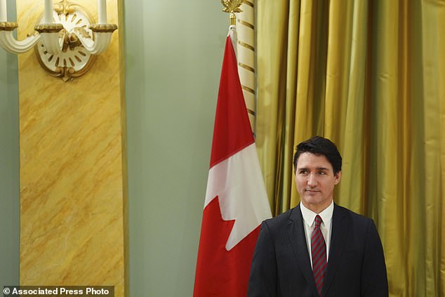 No Canadian prime minister in more than a century has won four consecutive terms. The federal elections must take place before October next year. Prime Minister Justin Trudeau looks on during Friday's cabinet swearing-in ceremony at Rideau Hall in Ottawa