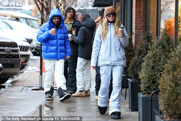 The duo were spotted holding hands and sipping a hot cup of coffee as they bundled up to beat the freezing temperatures