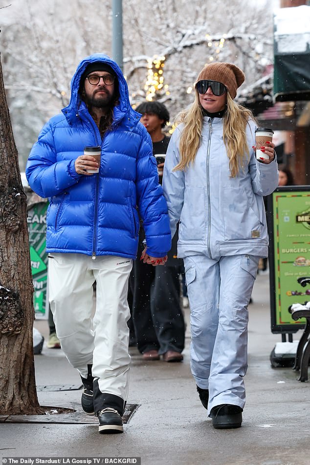 The 35-year-old guitarist wore a blue puffer jacket and white snow pants as the duo enjoyed the luxurious outing