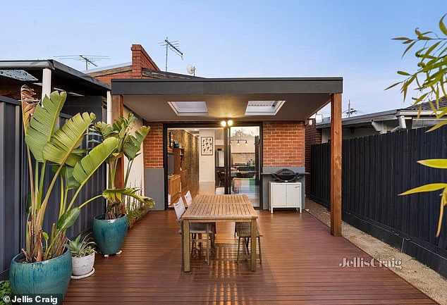 The airy layout of 165 Gilbert Road flows effortlessly into an expansive, covered outdoor space, perfect for summer barbecues, backyard sunbathing or a lush garden retreat