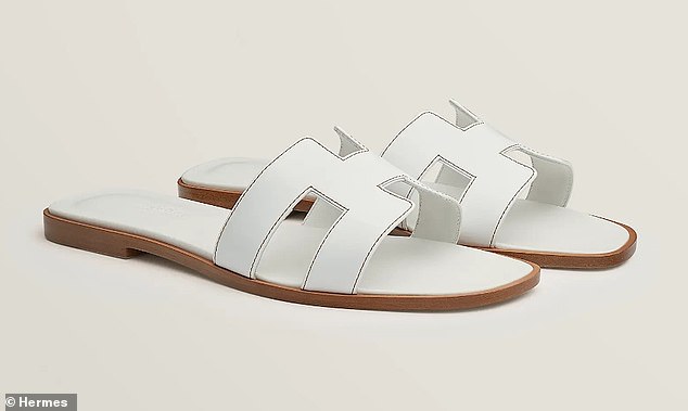 The budget-friendly sandals feature a sleek design reminiscent of the European luxury brand's signature 'H' strap [pictured]