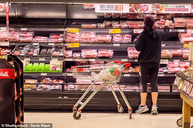 Bovaer senior vice-president Mark Van Nieuwland told the ABC the product had been widely tested and branded the conspiracy theories surrounding it as 'fake news' (pictured: a young woman shopping for meat in Coles)