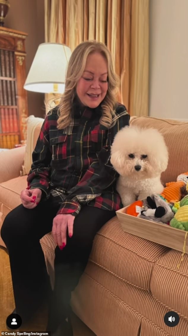 The 79-year-old Tony-winning producer spent her Christmas at home handing out presents to her adorable white dog, Julie Spelling