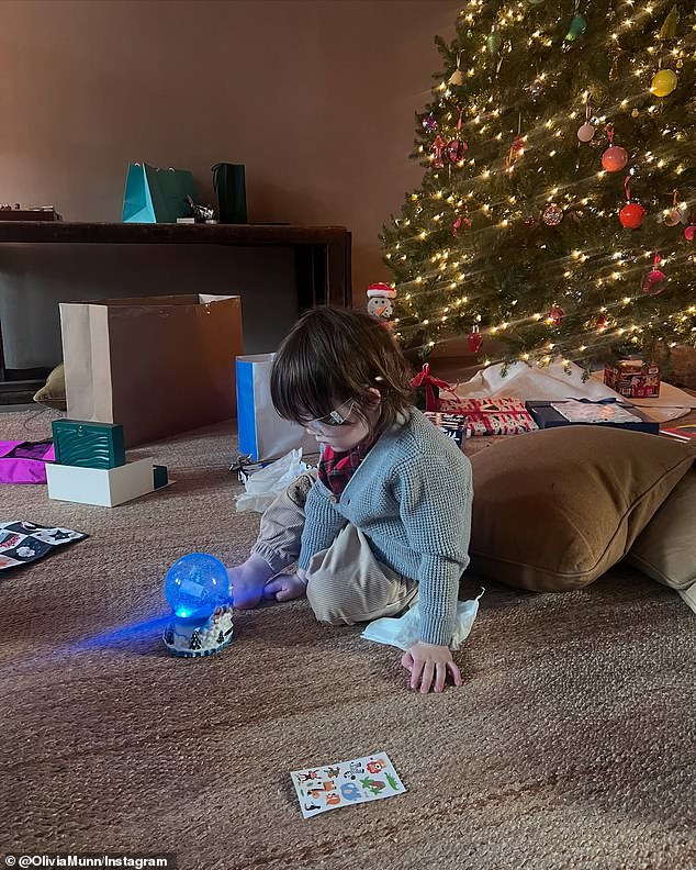 She also posted a photo of their three-year-old son Malcolm Hiệp playing with a snow globe